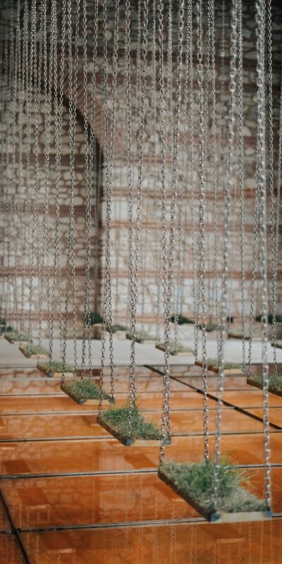 Contemporary Art Installation with Swings in an Old Building Interior